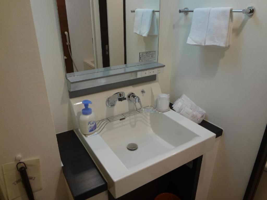 Hotel New Takada Tokio Habitación foto